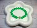 Green Cat Eye Beaded Stretch Bracelet with Green Cross
