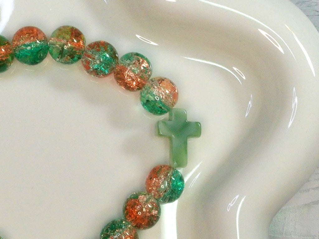 Orange and Green Beaded Stretch Bracelet with Green Cross