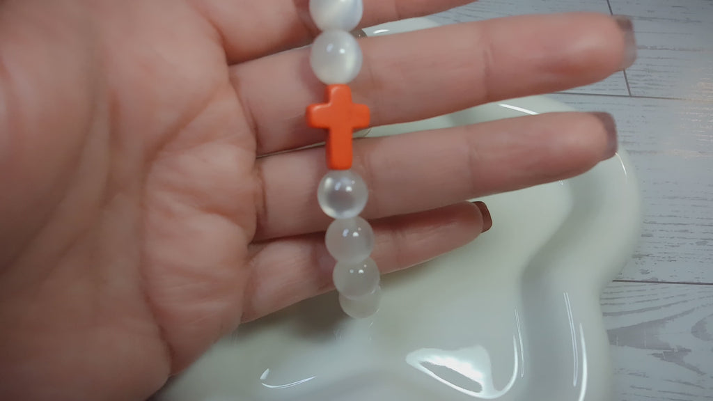 White Cat Eye Beaded Stretch Bracelet with Orange Cross